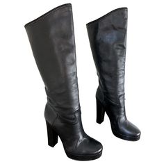 Stylish LANVIN Size 35 / US 5 black leather stacked high heel knee high boots! Perfect everyday boots that can easily be dressed up or down. Comfortable stacked heel. Great with jeans, a dress, or a skirt. In good condition. Made in Italy Marked Size 35 / US 5 (runs true to size) Knee High Sneakers, Century Shoes, Navy Blue Heels, Lanvin Sneakers, Heel Knee High Boots, Everyday Boots, Leather High Heel Boots, Jeanne Lanvin, Lulu Guinness