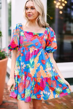 Once you slip in to this dress you will be ready to go! It's so cute and absolutely perfect for summer! All of those colors are so bold and bright! This is the dress you are going to reach for for summer date nights, brunch, and vacation! This dress features a square neckline, short puff sleeves, a babydoll fit, smocked back, and a colorful floral print. Material has no amount of stretch.Cam is wearing the small. Ss25 Prints, Money Dress, Colorful Dress, Preppy Dresses, Floral Cocktail Dress, Blue Floral Dress, Black Tie Dress, Clothes Pattern, Long Sleeve Outerwear