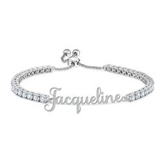 Timeless elegance made just for you!Your name is elegantly personalized on this stunning bracelet!Sparkling with 38 stunning simulated diamonds totaling over 6.5 carats. Beautifully presented, your bracelet will arrive in our signature keepsake pouch. Elegant Script Fonts, Danbury Mint, Script Font, Tennis Bracelet, Your Name, Diamond Bracelet, Timeless Elegance, Silver Tone, Tennis