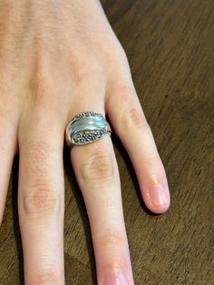 This ring is made of sterling silver. The stones are genuine Marcasite carefully set in silver. The center features delicate wavy lines. It will arrive polished and in a gift box. size 6. Silver Bypass Ring With Polished Finish As Gift, Unique Silver Bypass Ring For Anniversary, Unique Silver Bypass Ring For Gift, Wavy Lines, Sterling Silver Marcasite, Statement Ring, Rings Statement, Vintage Sterling Silver, Statement Rings