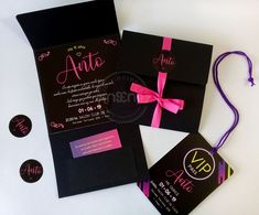 black and pink wedding stationery with matching envelopes, tags and ribbon on white background