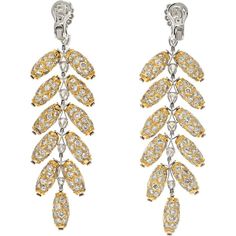 Celebrate the symphony of artistry and elegance in these 18K Two Tone 48.00 carat total weight Diamond Feather Dangling Earrings from our Estate Collection. These earrings are a free-spirited creation, capturing the beauty and all the glam of the peacock's feather motif in intricately detailed 18K yellow gold diamond jewels. Adorned with 2 center diamonds weighing 1.10 carats, 14 additional diamonds totaling 5.67 carats, and over 500 smaller diamonds approximating 42 carats, these earrings are a dazzling spectacle.The design of these earrings showcases a dramatic pendant feather style, making them a statement piece for any occasion. With a length of 3.6 inches and a width of 1 inch, they gracefully dangle and catch the light, highlighting their exquisite craftsmanship and attention to deta Diamond Birthstone, Diamond Jewel, Dangling Earrings, Fine Jewelry Collection, Free Spirited, Estate Jewelry, Gold Diamond, Diamond Earrings, Two Tone