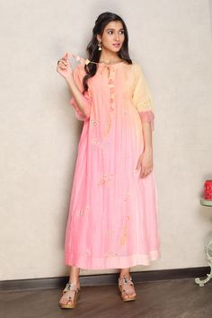 Pink and coral 4D shaded silk chanderi kurta with sequins and thread hand embroidery. Comes with a cotton mulmul slip.
Components: 2
Pattern: Hand embroidered
Type Of Work: Sequins, Thread
Neckline: Kurta : Notched, Slip : Round
Sleeve Type: Kurta : Three quarter, Slip : Sleeveless
Fabric: Kurta : Silk chanderi, Slip : Cotton mulmul
Color: Pink, Coral
Other Details: 
Closure : Front tie-up with tassels
Occasion: Mehendi and Haldi,Sangeet - Aza Fashions Pink Tunic, Pink Coral, Pink Silk, Womens Tunics, Aza Fashion, Sleeve Type, Three Quarter, Hand Embroidered, Hand Embroidery