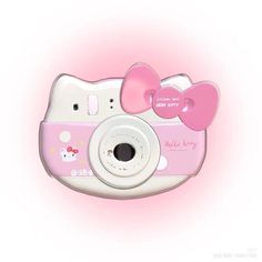 a pink and white hello kitty camera with two bows on it's front side