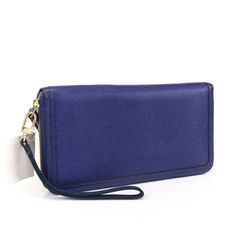 Item Is New With Tag Never Used. It Has Light Wear On Outer Edge On Small Detachable Wallet. See Last Photo - Made Of Leather - Approximately 9" (L) X 3/4" (W) X 4 3/4" (H) - Wristlet Strap Is Approximately 6 1/4". Strap Is Detachable. - Interior: Eleven Credit Card Slots, Four Bill Slots Two Zip Top Coin Pockets. - Zip Around. - Fabric Lining. - Gold Tone Hardware. Nd_wa_trvl_pur