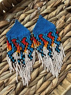 length 5.90 inch (15 cm) width 1.96 inch (5 cm) surgical steel ear hooks Multicolor Beaded Fringe Earrings With Unique Style, Unique Multicolor Beaded Fringe Earrings, Festival Multicolor Beaded Fringe Chandelier Earrings, Bohemian Blue Long Drop Beaded Earrings, Southwestern Dangle Beaded Earrings For Festivals, Southwestern Style Beaded Dangle Earrings For Festival, Southwestern Style Dangle Beaded Earrings For Festivals, Southwestern Style Earrings For Summer Festival, Southwestern Style Summer Festival Earrings