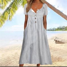 Elevate Your Summer Wardrobe With This Black And White Striped Midi Dress And Sail Off Into The Sunset! A Button-Front Notch Neck And Short Sleeves Keep You Cool And Chic. A Loose-Fitting Empire Waist And Front Pockets Give It Added Versatility. Finish Your Look With Wedges And A Straw Bag For A Beach Stroll. Very Lightweight.Neckline: Round Necksleeve Length: Short Sleevedress Length: Midipattern Type: Stripedsilhouette: A-Lineside Pocketsmaterial: 45% Elastane, 55% Rayonmachine Washable New In Button Up Maxi Dress, Mode Tips, Womens Long Dresses, Dress Sleeve Length, Cotton Blends Dress, Simple Dress, Crewneck Dress, Polyester Dress, Types Of Dresses