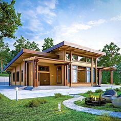 a large house sitting on top of a lush green field