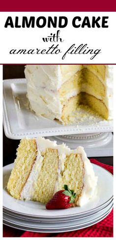 a slice of cake with white frosting and strawberries on the plate next to it