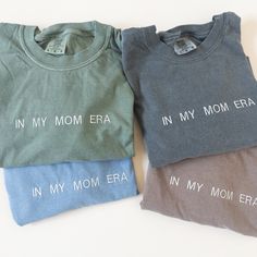 IN MY MOM ERA tshirt! Lightweight cozy t-shirt perfect Mother's Day gift, new mom present, or baby shower gift. Custom embroidered design with either matching monochromic thread or ivory white thread and neutral minimal modern design. This tshirt is unisex in size, runs true to size. Size up for an oversized fit!  Comfort Colors T-shirt  -garment dyed ring spun fleece  -pre shrunk  -pigment dyed for a vintage, lived in feel For other design options please visit my shop page 😊 If you are not com Casual T-shirt With Embroidered Text For Mother's Day, Personalized Casual Cotton T-shirt, Casual Personalized Cotton T-shirt, Casual Tops With Embroidered Text For Mother's Day, Casual Top With Embroidered Text For Mother's Day, Personalized Green Cotton T-shirt, Mother's Day Gift Tops With Embroidered Text, Mother's Day Embroidered Text Tops, Personalized Green Cotton Tops