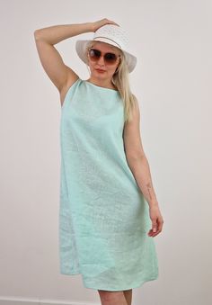 Loose linen dress for your most comfortable everyday! This dress has a bit oversized and sleeveless design with V from the back. Made from washed linen fabric,  that is breathable and just created for summer weather, this dress will definitely make your day! Dress is machine washable and won't shrink, as linen fabric is already washed. Choose any of 25+ colors and enjoy your summer day! DETAILS: - 100% stonewashed LINEN, breathable, Eco-friendly material - Machine washable - Loose, oversized  - Green Linen Sleeveless Sundress, Green Linen Sleeveless Summer Dress, Sleeveless Linen Dress For The Beach, Sleeveless Linen Sundress For The Beach, Sleeveless Linen Summer Dress For Daywear, Sleeveless Linen Dress For Vacation, Green Sleeveless Linen Dress For Summer, Green Summer Linen Beach Dress, Green Summer Linen Dress For Beach