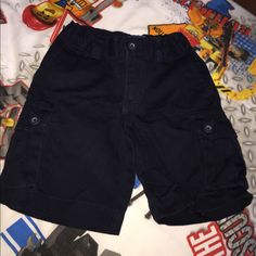 Excellent Never Worn, Elastic Adjustment Button Inside. Navy Color Casual School Bottoms With Button Closure, Playtime Bottoms With Pockets And Short Length, Blue Bottoms With Pockets For Playtime, Short Bottoms With Pockets For Playtime, Blue Cotton Shorts With Buttons, Blue Bottoms With Pockets For Playwear, Blue Cotton Shorts With Button Closure, Blue Short-length Bottoms For Playtime, Blue Playtime Bottoms Shorts