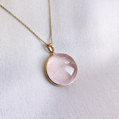 This stunning pendant is set in 14k Solid Yellow Gold with Natural Rose Quartz with utmost precision. It is an unique gemstone pendant for nearly every occasion and is completely hassle-free jewelry. 🔷ABOUT GEMSTONE:  Rose quartz is often called the "Stone of Love" and is believed to promote all forms of love, including self-love, romantic love, and love for others. It can help individuals open their hearts to love and develop a greater sense of compassion and empathy. Rose quartz is often call Elegant Faceted Rose Quartz Necklace, Elegant Rose Quartz Faceted Necklace, Rose Gold Jewelry With Bezel-set Round Pendant, Rose Gold Jewelry With Round Pendant And Bezel Setting, Rose Gold Necklace With Gemstone Round Pendant, Rose Gold Jewelry With Bezel Setting And Round Stone, Rose Gold Jewelry With Bezel Setting, Elegant Pink Gold Jewelry With Bezel Setting, Fine Jewelry In Rose 14k Gold