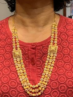 22 Karat Gold 'Lakshmi' Long Necklace & Drop Earrings Set with Uncut Diamonds,Ruby,Emerald & South Sea Pearls
       - 235-DS420 - in 113.250 Grams for USD $12725.52. 
Made in India by Totaram Jewelers Online this product is in Gold - 22 Karat BIS Hallmark 916 KDM Gold  & is an excellent gift for Adult - Women. Ships fully insured with secured guaranteed delivery for free with your order over $250 from New Jersey USA & comes with 30 days exchange policy. Gold Temple Necklace For Diwali Reception, Gold Temple Necklace With Cutdana For Receptions, Gold Necklaces With Zari Work For Reception, Gold Temple Necklace For Reception And Festivals, Gold Temple Necklace With Zari Work For Reception, 22k Yellow Gold Bridal Necklace For Reception, 30gms Gold Long Necklace, Gold Long Necklace With Grams, Coral Long Chain Gold