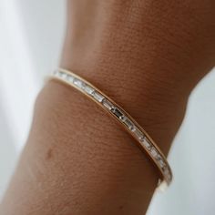 Elevate your style with our Crystal Bangle Bracelet. This 18k gold-plated piece is beautifully adorned with sparkling crystals, offering a refined and elegant charm that complements any outfit. Wedding Bride Jewelry, Womens Bangles, Prom Accessories, The Bangles, Gold Plated Bangles, Crystal Bangle, Stone Bangle, Bangles Style, Anniversary Jewelry