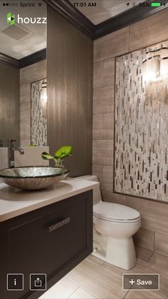 a bathroom with a bowl sink and toilet