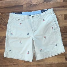 New Polo Ralph Lauren Nautical Sailing Khaki Shorts Size: 36 Color: Tan Blue Red Brand New With Tags Cotton Bermuda Bottoms For Beach Season, Nautical Style Summer Vacation Bottoms, Preppy Short Length Beach Bottoms, Preppy Summer Shorts With Pockets, Preppy Cotton Beach Shorts, Preppy Cotton Shorts For Beach, Preppy Cotton Shorts For The Beach, White Preppy Cotton Shorts, Preppy Cotton Vacation Bottoms