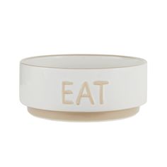 a white bowl with the word eat on it