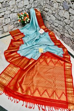 Get in some action with our latest collection of sky blue color pure gadwal silk saree with graph check work on the whole body with paisley motif work alluring the whole body and traditional zari weaving work in kadhua style on the pallu and the border. Color: A shade of sky blue color Technique: Amazing work of golden zari work with check pattern work on the body with traditional weaving on the rest of the saree Fabric: Gadwal Silk Quality: Indyvogue's Assurance of Pure Silk Mark Certified Saree How To Wash Silk, Checks Saree, Paisley Motif, Sky Blue Color, Blouse Measurement, Color Techniques, Traditional Weaving, Zari Work, Saree Fabric