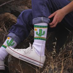 Introducing our charming Cactus Socks, thoughtfully crafted in the United States. These delightful socks are designed to bring a touch of desert beauty to your wardrobe. Made with exceptional quality and attention to detail, these socks feature adorable cactus designs that will add a playful and stylish twist to any outfit. Slip them on, and you'll experience the utmost comfort and coziness as they embrace your feet. Whether you're exploring the outdoors or simply lounging at home, our Cactus So Casual Summer Socks For Gifts, Casual Summer Socks As Gift, Casual Summer Socks For Gift, Casual Handmade Green Socks, Cactus Socks, Stylish Socks, Cactus Design, Cotton Socks, Men Shoes Size