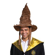 Carry out the magic when you step out in the officially licensed deluxe harry potter sorting hat. Sort all the students of hogwarts into their houses. Which house will it be - gryffindor, hufflepuff, ravenclaw or slytherin? This magical enchanting wizard hat is rarely wrong. Let the sorting ceremony begin! The harry potter deluxe adult sorting hat features a brown hat with tattered ties that hang down from inside the hat. The faux-stitching and patches on the hat provides an old and worn look. One size fits most adults (14+). Character: Harry PotterBase Material: 100% PolyesterCare: Hand WashCountry of Origin: Imported Sorting Ceremony, Hogwarts Sorting Hat, Harry Potter Kostüm, Harry Potter Sorting, Harry Potter Accessories, Harry Potter Sorting Hat, Witch Costumes, Party Expert, Harry Potter Costume