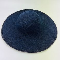 Coarsely braided sisol capelin in the color navy blue. It is perfect for hats with small or medium brims. Diameter 42cm Edge width 11 cm finely braided Non-slip yet soft quality and yet light. The hat blank is unstiffened. ATTENTION: THIS IS NOT A FINISHED HAT, BUT A HAT BLANK FOR MAKING HATS The sisals get their name from a hemp - sisal hemp. They are hand-woven in China. Mainly the Manila hemp imported from the Philippines is used. Unfortunately, there are fewer and fewer straw weavers, so thi Hat Blank, Blank Color, Making Hats, Blank Hats, Hat Base, The Philippines, Hand Woven, Philippines, Straw