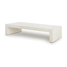 a white coffee table sitting on top of a white floor