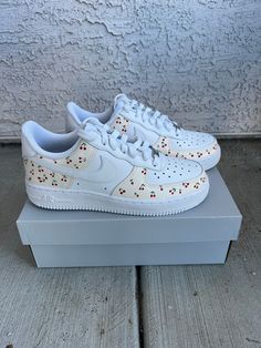 Hand painted Air Force 1's. This design is gender-neutral and fits every occasion.  This design is one of my favorites; however, I can design the exact shoe you're looking for upon request in any size (please message). Whether you're treating yourself or looking for a personalized gift, these one-of-a-kind sneakers will definitely turn heads and elevate your streetwear style. This design can be painted onto any size of your choice upon purchasing. When ordering, please let me know which size you Custom White Sneakers With Rubber Sole, Custom White Leather Sneakers, Custom White Sneakers For Spring, Custom White Lace-up Sneakers, White Hand Painted Lace-up Sneakers, Hand Painted White Low-top Custom Sneakers, Casual Hand Painted White Custom Sneakers, Casual Hand Painted White Sneakers, Hand Painted White High-top Custom Sneakers