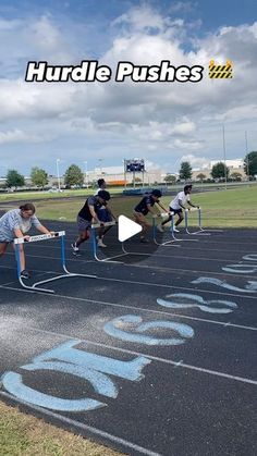 four people are competing in a track race with the words huddle pushes on it