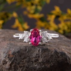 "Simple & dainty womens sterling silver ruby ring, Unique ruby promise ring for her, Womens art deco ruby silver ring, Ruby engagement ring WE OFFER UNLIMITED PERIOD INSTALLMENTS PLAN This is a beautiful, stunning, feminine ring that works well for all occasions, styles, and ages. You will love it! Ring information Main stone: White cubic zirconia Approximate size: 6x4mm Accent stones: White cubic zirconia Approximate size: 2.0mm (6 stones) Metal type: Silver Metal stamp: 925 Sterling SIlver Elegant Lab-created Ruby Jewelry For Promise, Elegant Jewelry With Lab-created Ruby For Promise, Lab-created Ruby Promise Ring With Diamond Accents, Elegant Ruby Ring With Cubic Zirconia Birthstone, Ruby Rings With Diamond Accents For Gift, Lab-created Ruby Ring With Diamond Accents As Gift, Elegant Promise Ring With Lab-created Ruby, Lab-created Ruby Rings With Diamond Accents For Gift, Gift Ring With Diamond Accents And Lab-created Ruby