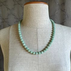 "Style: Estate Burmese jade round bead necklace, natural color fei cui, with a matching silver clasp. 58 beads Material: Natural Jadeite, jadeite, vintage, Burmese jade, green, silver clasp Method: fine polished Type: Necklace, bead necklace Size: bead size 9mm, length 23\" no.7" Elegant Round Amazonite Necklace, Jade Gemstone Beads Necklaces, Elegant Round Jade Beaded Necklaces, Elegant Jade Beaded Necklace With 8mm Beads, Elegant Amazonite Bead Necklaces, Green Amazonite Necklaces, Elegant Amazonite Beaded Necklace, Turquoise Aventurine Round Bead Jewelry, Elegant Amazonite Round Beads Jewelry