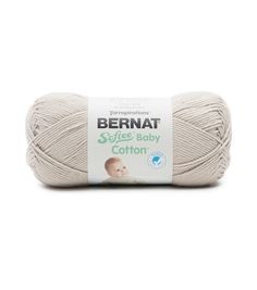 bernat softe baby cotton yarn ball in white, with the label on it