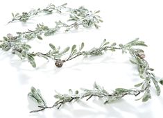 PRICES MAY VARY. This snow and glitter dusted garland is decorated with mini pinecones to add texture and variety The elegant podocarpus leaves give a unique, yet elegant look 70 inches long For indoor and covered outdoor use This garland makes a great addition to your winter home decor. With miniature leaves and pinecones it is dainty and wispy, but adds a unique look to any space. Use alone or add to other pine decorations to personalize the look. Crochet Evergreen Garland, Mini Pinecones, Moon Dreamcatcher, Something Just Like This, Christmas Decorations Garland, Pine Garland, Artificial Garland, Boho Room Decor, Glitter Dust