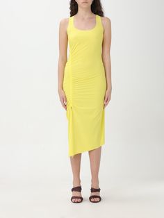 This jersey dress characterized by essential lines features a distinctive asymmetrical neckline that gives the garment a modern and seductive allure. Close-fitting with split opening and length at the knee. Technical stretch jersey Close-fitting Length below the knee The model is 1.76 m tall and wearing a size 40/XS/0 (IT) 2A2788-JZ26 Elastane Midi Dress With Ruched Sides, Elastane Bodycon Dress With Asymmetrical Neckline, Spring Asymmetrical Elastane Dresses, Ruched Sheath Midi Dress, Fitted Sleeveless Asymmetrical Elastane Dress, Spring Dresses With Ruched Sides In Elastane, Spring Dresses With Ruched Sides, One-shoulder Stretch Midi Dress, Chic Asymmetrical Stretch Dress In Elastane