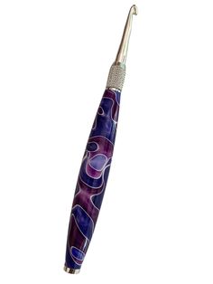 an artistically designed purple and blue toothbrush