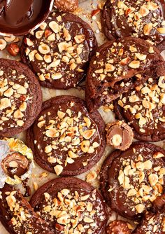 chocolate cookies covered in nuts and melted chocolate