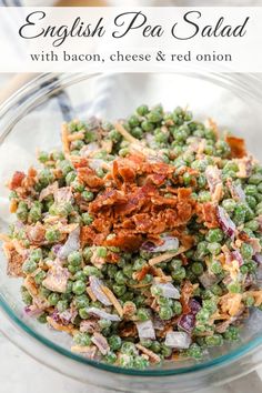 a glass bowl filled with peas and bacon