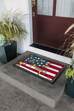 a door mat with an american flag on it