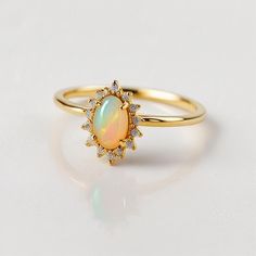 Opal ring for women gold, sterling silver opal ring vintage opal ring white gold, opal jewelry Opal Ring for Women - Vintage Gold and Sterling Silver Opal Jewelry Description: Elevate your style with our exquisite Handmade Opal Ring for Women, meticulously crafted to capture the timeless allure of opals. Available in both classic sterling silver and elegant gold, this vintage-inspired piece is a true testament to opal's natural beauty. Specifications: Material: Solid 925 sterling silver / Gold P Elegant Opal Cabochon Ring, Elegant Hallmarked Ethiopian Opal Ring, Elegant Ethiopian Opal Ring, Hallmarked, Silver Opal Dainty Rings, Dainty Opal Cabochon Jewelry, Dainty Silver Opal Rings, Elegant Gold Opal Ring, Dainty Opal Silver Rings, Elegant Hallmarked Opal Ring