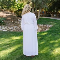 You'll love the newest addition to our All In White collection. Features: True white long sleeve maxi. Elastic at cuff. Lace trim on bodice. Keyhole with button at the back. Elastic waist. Side pockets. Skirt is lined. Fits true to size. Model is 5'10 and is wearing a 1x Size Chart Length Bust Waist S 58" 34" 29" M 58" 36" 31" L 59" 40" 32" XL 60" 42" 36" 1x 60" 46" 44" 2x 60" 50" 44" 3x 60" 54" 48" *All measurements are approximate and done while hanging.* Fabric and Care 100% RayonLining: 95% White Lace Maxi, Hanging Fabric, All In, Lace Maxi, Long Sleeve Maxi, White Maxi Dresses, White Long Sleeve, White Lace, Lace Trim