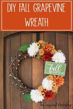 a grapevine wreath with flowers on it and the words, diy fall grapevine wreath