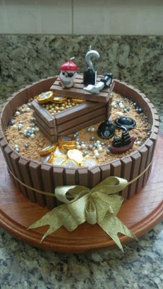 there is a cake that looks like a pirate's chest