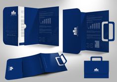 an open brochure is shown with blue paper and folders next to it