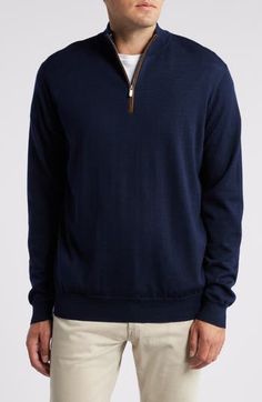 Breathable wool and silky lyocell bring exceptional comfort to a sweater knit with a lightweight, layerable fit and a short zipper framed in soft suede. 28" length (size Medium) Quarter-zip closure Stand collar Long sleeves Ribbed cuffs and hem 75% merino wool, 25% lyocell Hand wash, dry flat Imported Casual Cashmere Half-zip Sweater, Casual Half-zip Cashmere Sweater, Casual Wool Half-zip Sweater, Casual Wool Sweater With Zipper Closure, Long Sleeve Wool Sweater With Zipper Closure, Wool Sweater With Zipper Closure And Long Sleeves, Short Zipper, Quarter Zip Sweater, Peter Millar