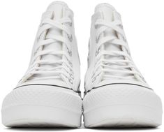 High-top buffed leather sneakers in white. · Lace-up closure · Eyelet vents and leather logo patch at inner side · Canvas lining · Foam rubber platform midsole featuring black stripe · Tonal treaded rubber outsole · Approx. 2 platform Supplier color: White/Black Converse White Leather, Converse For Women, Leather Chuck Taylors, White Chuck Taylors, White Chucks, Chuck Taylor All Star Lift, Converse White, High Sneakers, Leather Logo