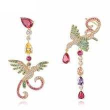 Seymour Asymmetrical Crystal Phoenix Bird Dangle Statement Earrings – ANN VOYAGE Trending Earrings, Travel Inspired Jewelry, Crystal Jewelry Necklaces, Fish Earrings, Wholesale Necklaces, Phoenix Bird, Earring Trends, Animal Earrings, Dream Jewelry