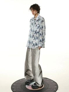 Make a statement with the Abstract Pastel Floral Print Oversized Shirt, where comfort meets an artistic edge.
Crafted with a smooth, lightweight fabric, this long-sleeved shirt showcases an all-over floral print in soft pastel hues. It's designed with a relaxed oversized cut, making it a breezy choice for those looking to combine casual with a touch of sophistication. The thoughtful tailoring includes a conventional collar, giving it a structured yet nonchalant silhouette that captures an understated yet impactful style.
This versatile shirt lends itself to a variety of looks, perfect for a laid-back weekend or a casual day at the office. It pairs effortlessly with slim-fit trousers or your favourite denim for an easy-going, yet polished ensemble. Embrace a fusion of retro and modern sensi Oversized Floral Print Shirt For Fall, Spring Long Sleeve Shirt With Abstract Print, Oversized Long Sleeve Shirt With Abstract Print, Oversized Long Sleeve Printed Blouse, Oversized Printed Long Sleeve Blouse, Long Sleeve Blouse With Floral Print And Relaxed Fit, Long Sleeve Floral Print Shirt With Relaxed Fit, Oversized Printed Spring Blouse, Oversized Printed Blouse For Spring