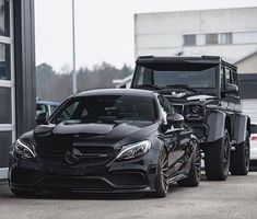 the mercedes benz amg is parked next to other cars