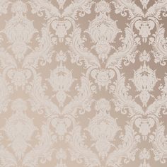 an old fashioned wallpaper pattern in beige and white