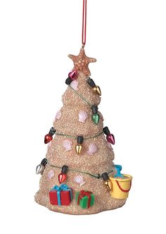 a christmas tree ornament with lights and presents hanging from it's top